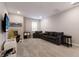 Bright game room featuring a TV, arcade game, and comfortable seating at 3210 Desert Plain Cv, Lakewood Ranch, FL 34211