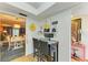 Cozy dining area featuring a charming coffee bar and seating for two, perfect for enjoying morning coffee at 3562 Lake Bayshore Dr # 202, Bradenton, FL 34205