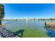 Scenic lake view with a fishing pier at 3562 Lake Bayshore Dr # 202, Bradenton, FL 34205
