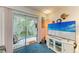 Living area with sliding glass door access to outdoor seating at 3562 Lake Bayshore Dr # 202, Bradenton, FL 34205