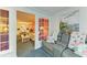 Cozy living room area open to the dining area with comfortable reclining seating at 3562 Lake Bayshore Dr # 202, Bradenton, FL 34205