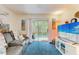 Comfortable living area featuring lanai access and decor at 3562 Lake Bayshore Dr # 202, Bradenton, FL 34205