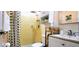 Cozy bathroom featuring updated fixtures, a shower, and a modern vanity at 3915 40Th W St, Bradenton, FL 34205