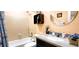 Well-lit bathroom featuring a shower-tub combination and a vanity at 3915 40Th W St, Bradenton, FL 34205