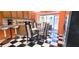 Bright dining area with breakfast bar, and backyard views from sliding glass doors at 3915 40Th W St, Bradenton, FL 34205