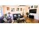 Inviting living room featuring hardwood floors, stylish furnishings, and a modern entertainment setup at 3915 40Th W St, Bradenton, FL 34205