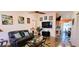Inviting living room featuring hardwood floors, stylish furnishings, and a modern entertainment setup at 3915 40Th W St, Bradenton, FL 34205