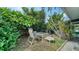 Lush backyard oasis with mature landscaping and outdoor seating, ideal for entertaining and relaxation at 4015 52Nd Street W Ct, Bradenton, FL 34209