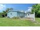 Inviting backyard featuring a well-maintained lawn, offering a serene and private outdoor space at 4015 52Nd Street W Ct, Bradenton, FL 34209