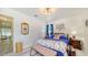 Charming bedroom with stylish decor and furnishings, creating a cozy and comfortable ambiance at 4015 52Nd Street W Ct, Bradenton, FL 34209