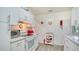 Functional kitchen with white cabinets and modern appliances, ideal for culinary enthusiasts at 4015 52Nd Street W Ct, Bradenton, FL 34209
