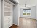 Bedroom closet featuring built-in shelving and drawers for optimal storage and organization at 4138 Central Sarasota Pkwy # 1524, Sarasota, FL 34238