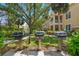 Community outdoor grills with lakeside views at 4138 Central Sarasota Pkwy # 1524, Sarasota, FL 34238