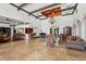 Elegant lobby with a piano, bar, fireplace, and travertine tile flooring at 4138 Central Sarasota Pkwy # 1524, Sarasota, FL 34238
