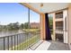 Relaxing screened balcony offering scenic lake views at 4138 Central Sarasota Pkwy # 1524, Sarasota, FL 34238