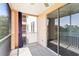 Inviting screened balcony, perfect for outdoor relaxation with serene lake views at 4138 Central Sarasota Pkwy # 1524, Sarasota, FL 34238