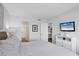 Comfortable bedroom with view into bathroom and out to the main living area at 4310 Falmouth Dr # 305, Longboat Key, FL 34228