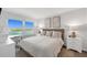 Inviting bedroom features serene water views, a plush bed, and neutral decor at 4310 Falmouth Dr # 305, Longboat Key, FL 34228