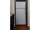 A white refrigerator stands in a kitchen corner, providing modern convenience at 4639 Sloan Ave, Sarasota, FL 34233
