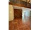 A view of the living room with high ceilings and wood trim at 4639 Sloan Ave, Sarasota, FL 34233