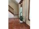 Inviting living room featuring a staircase and large windows for ample natural light at 4639 Sloan Ave, Sarasota, FL 34233