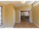 Bright, open living area featuring wood floors and plenty of natural light at 4639 Sloan Ave, Sarasota, FL 34233