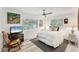 Cozy bedroom featuring soft lighting, a comfortable bed, and stylish decor at 501 Sloop Ln, Longboat Key, FL 34228