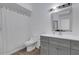 Clean bathroom with a vanity, mirror, and a shower featuring a shower curtain at 5122 Northridge Rd # 112, Sarasota, FL 34238