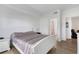 Bedroom featuring hardwood floors and access to a bathroom and living room at 5122 Northridge Rd # 112, Sarasota, FL 34238