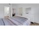 Bright bedroom featuring a neutral color scheme and hardwood flooring at 5122 Northridge Rd # 112, Sarasota, FL 34238