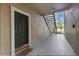 Apartment entryway with unit number, and an exterior staircase at 5122 Northridge Rd # 112, Sarasota, FL 34238