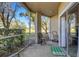 Private screened patio with views of the grassy common area at 5122 Northridge Rd # 112, Sarasota, FL 34238