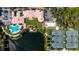 Aerial view of clubhouse featuring pool, tennis courts, and parking at 5509 Avellino Pl, Sarasota, FL 34238