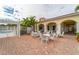 Outdoor seating area with tables, chairs and pergola at 5509 Avellino Pl, Sarasota, FL 34238