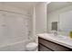 Clean bathroom with a shower-tub combination, a modern vanity and neutral color scheme at 5547 Logan Cave Ave, Wimauma, FL 33598