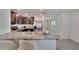 Kitchen with stainless steel appliances, granite countertops, and a breakfast bar at 5547 Logan Cave Ave, Wimauma, FL 33598