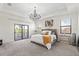 Light-filled main bedroom with a beautiful golf course view at 5609 Arnie Loop, Lakewood Ranch, FL 34211