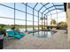 Inviting pool with sun loungers and a scenic water view, perfect for relaxation at 5609 Arnie Loop, Lakewood Ranch, FL 34211