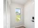 The entryway presents a bright and welcoming atmosphere at 5689 Evergreen Dr # 18, Sarasota, FL 34233