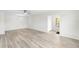 Bright living room with modern flooring and plenty of natural light at 5689 Evergreen Dr # 18, Sarasota, FL 34233