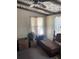 Bedroom featuring a ceiling fan and two windows at 6324 Case Ave, Bradenton, FL 34207