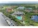 Breathtaking view showcasing waterfront homes, marina, pool and lush golf course community at 643 Misty Pond Ct, Bradenton, FL 34212