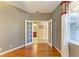 Versatile office space showcases French doors to an adjacent bathroom and natural lighting at 643 Misty Pond Ct, Bradenton, FL 34212
