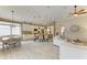 Open floorplan with a dining area and a kitchen combined with the living room at 643 Misty Pond Ct, Bradenton, FL 34212