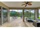 Relaxing screened-in patio with comfortable seating overlooking a peaceful water view, perfect for outdoor entertaining at 643 Misty Pond Ct, Bradenton, FL 34212