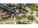 Lovely aerial view of a home with a pool, situated in a neighborhood with mature trees at 6583 Waterford Cir, Sarasota, FL 34238