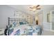 Comfortable bedroom with bright décor and a view of the en-suite bathroom at 6583 Waterford Cir, Sarasota, FL 34238