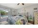 Inviting bedroom with bright decor and direct access to the pool area at 6583 Waterford Cir, Sarasota, FL 34238