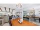 Open dining area with views into the living room and lots of natural light at 6583 Waterford Cir, Sarasota, FL 34238