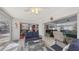 Open lanai area with a view of other interior areas, and access to the patio at 6583 Waterford Cir, Sarasota, FL 34238